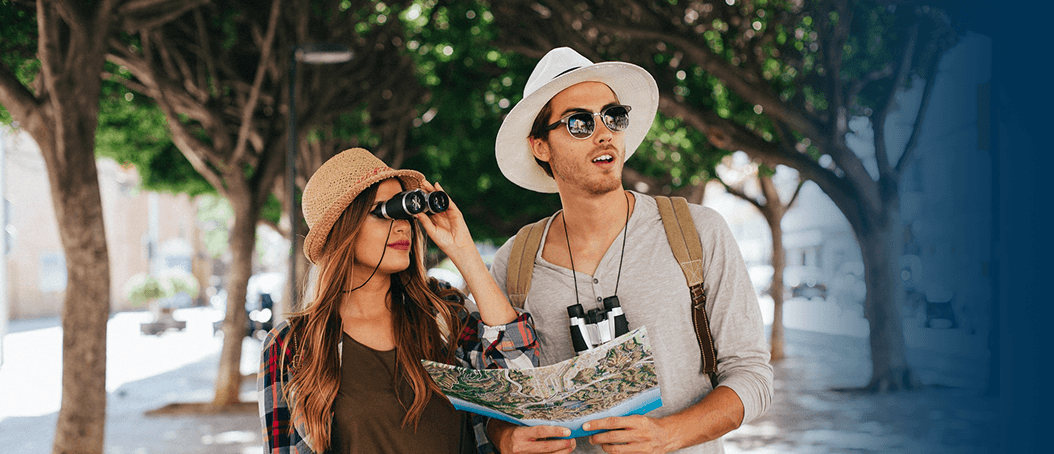 Travelers looking at map